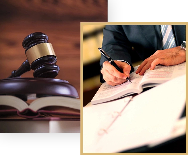 A judge 's gavel and a person writing on paper.